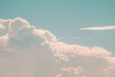 Beautiful white fluffy clouds sky background abstract season and weather.