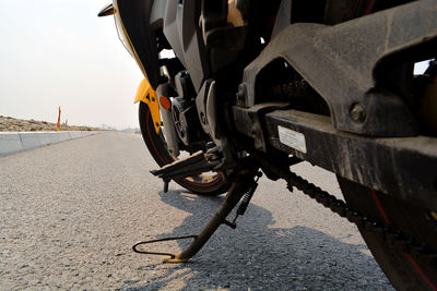 Close-up of bicycle on road
