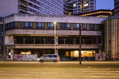 View of buildings in city at night