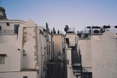 Residential buildings against clear sky