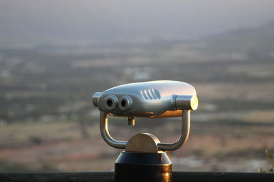 Close-up of coin-operated binoculars