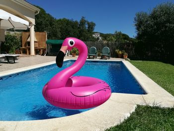 View of swimming pool against blue sky