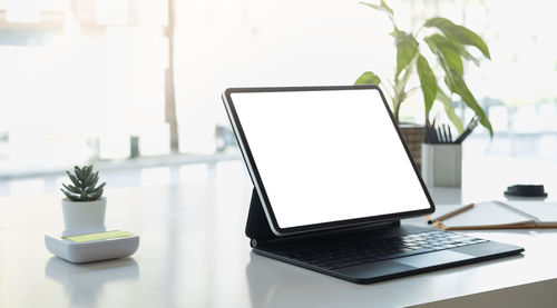 Close-up of laptop on table
