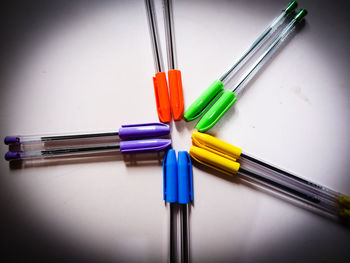 High angle view of colorful paper on table