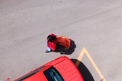 High angle view of man on red road
