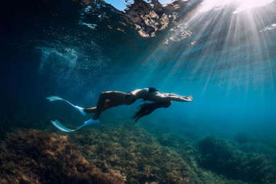 Man swimming in sea