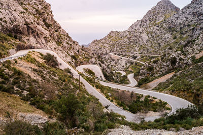 Scenic view of mountain road against sky