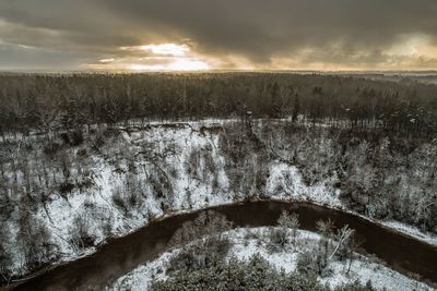 High angle view of snow covered landscape against sky