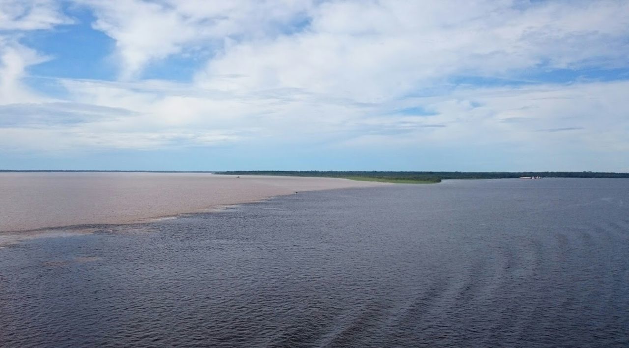 VIEW OF BEACH AGAINST SKY