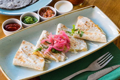 High angle view of food served on table