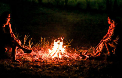 Bonfire on field at night