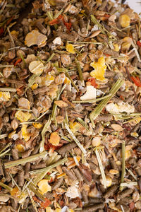 High angle view of dry leaves on field