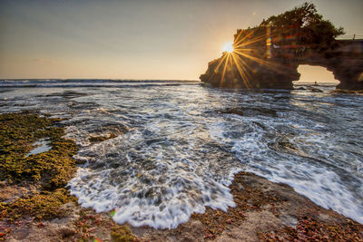 View of calm sea at sunset