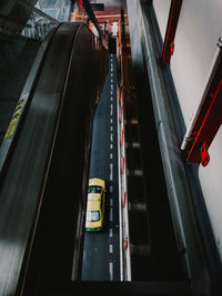 High angle view of vehicles on railroad tracks