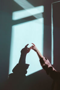 Shadow of people on wall