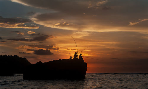 Scenic view of sea at sunset