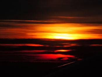 Scenic view of dramatic sky during sunset