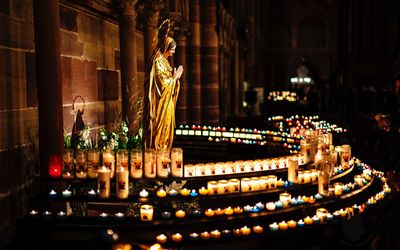 Illuminated sculpture of building at night