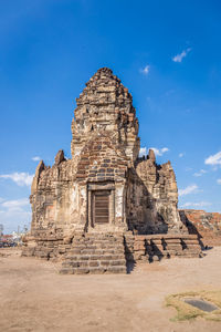 Old ruins of temple against blue sky