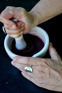 Close-up of man holding hands