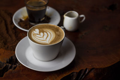 Close-up of coffee cup on table