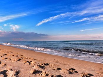 Scenic view of beach against sky