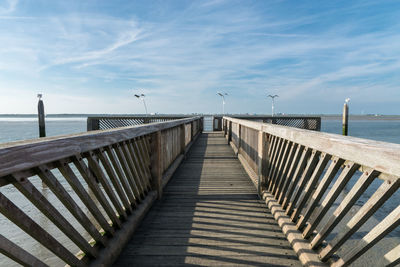 View of pier on sea against sky