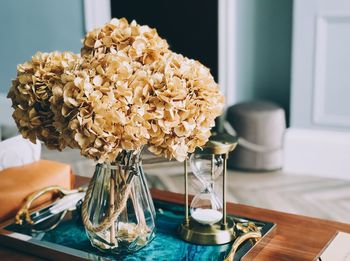 Close-up of flower vase on table