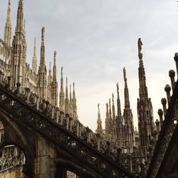 Low angle view of milan cathedral against clear sky