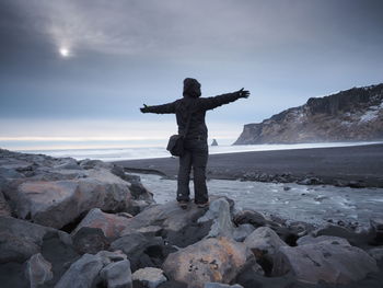 Silhouette of man standing on landscape