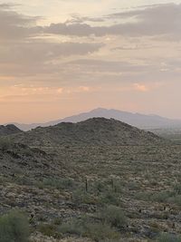 Scenic view of landscape against sky during sunset