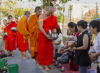 Group of people standing in temple