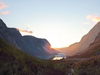 Scenic view of mountains against sky during sunset