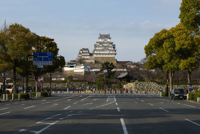 View of city street against sky