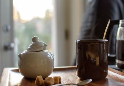 Close-up of tea served on table at home