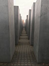 View of alley amidst buildings