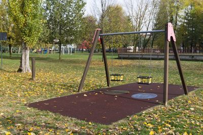 Empty swing in park