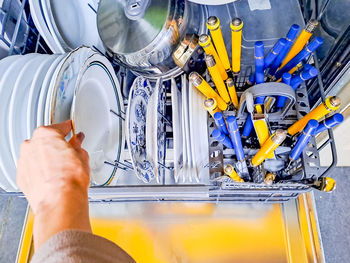 Cropped hand of person working on table