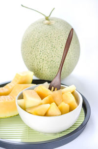Close-up of fruits in bowl on table