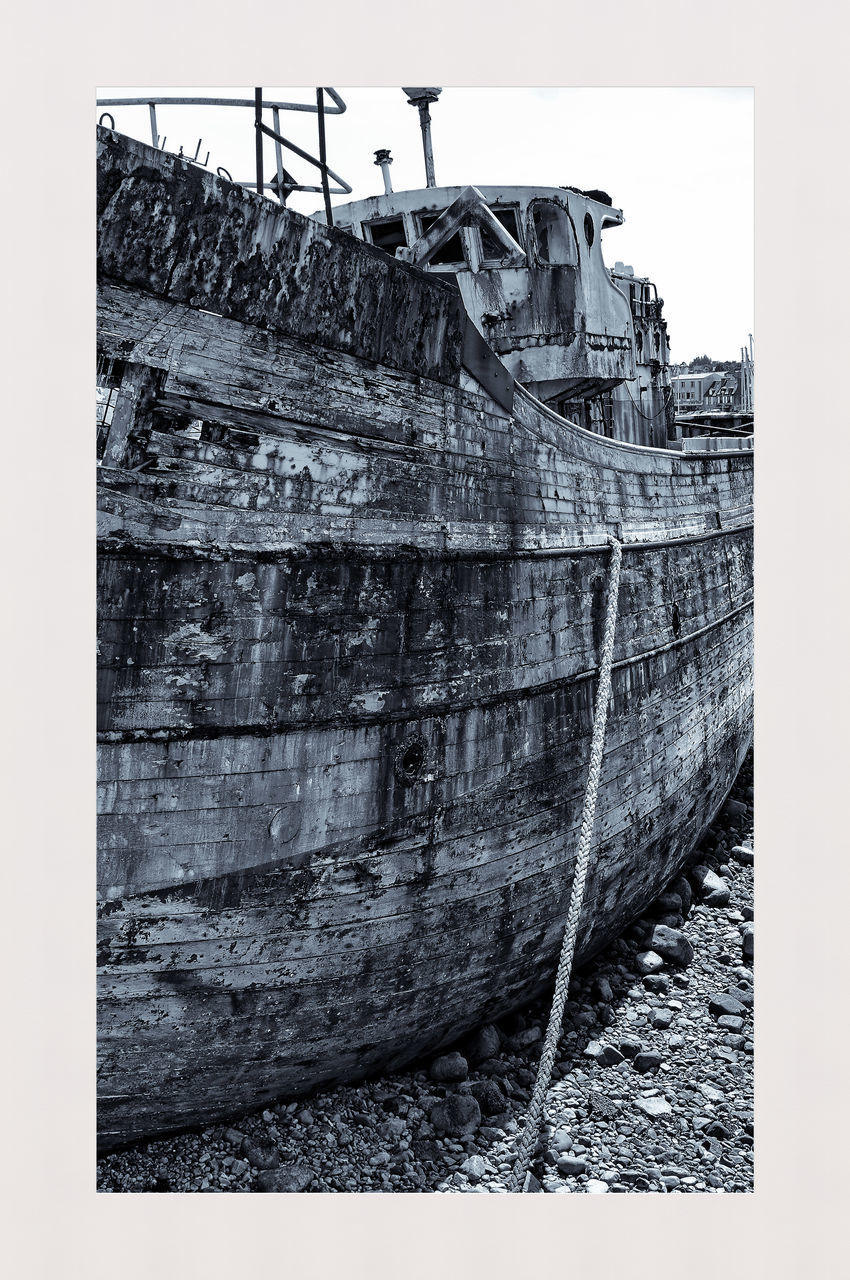 DAMAGED BOAT IN ABANDONED BUILDING