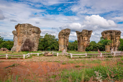 View of stone structure against cloudy sky