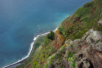 High angle view of sea and mountains