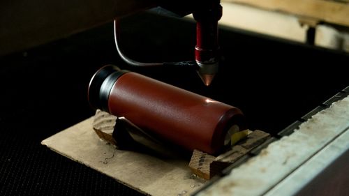 Laser work on red tumbler