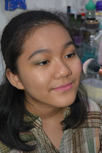 Close-up portrait of smiling woman