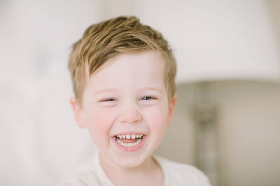 Portrait of preschooler laughing at the camera