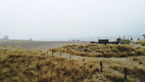 Scenic view of beach against clear sky