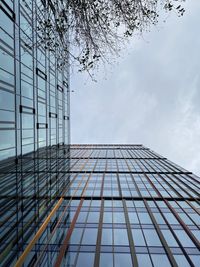 Low angle view of skyscraper against sky