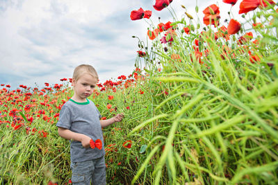 Full length of child standing on field