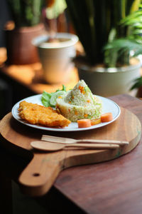 Close-up of food in plate on table