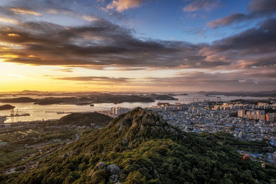 High angle view of townscape against sky during sunset